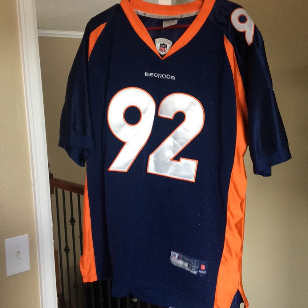Elvis Dumervil signed by Mike Adams, Tracy Porter
